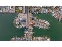 Bird's eye view of the house and surrounding canal and community at 6407 1St Palm Pt, St Pete Beach, FL 33706