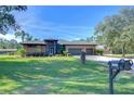 Spacious home with a large yard and circular driveway at 8345 Shenandoah Run, Wesley Chapel, FL 33544