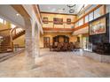 Elegant dining room with a large table and fireplace at 18409 Tyler Rd, Odessa, FL 33556
