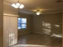 Bright living room with tile floors and neutral walls at 2171 Portofino Pl # 27-2717, Palm Harbor, FL 34683