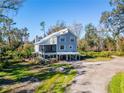 Aerial view of a two story house with a large backyard at 4501 Keene Rd, Plant City, FL 33565