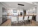 Modern kitchen with large island and stainless steel appliances at 100 1St N Ave # 1601, St Petersburg, FL 33701
