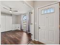 Bright entryway with hardwood floors and a view into a room at 8436 Red Roe Dr, New Port Richey, FL 34653