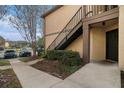 Condo exterior showing stairs and entrance at 2400 Feather Sound Dr # 418, Clearwater, FL 33762