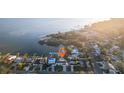 Aerial view showing home's waterfront location and private pool at 380 Colony Point S Rd, St Petersburg, FL 33705