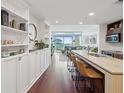 Modern kitchen with granite counters and breakfast bar at 912 Channelside Dr # 2601, Tampa, FL 33602