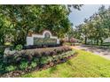 Landscaped entrance to The Highlands condominium community at 9481 Highland Oak Dr # 807, Tampa, FL 33647
