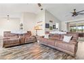 Spacious living area with two reclining sofas and an open floor plan at 1307 Windjammer Pl, Valrico, FL 33594