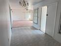 Home entryway with tiled floor and view of living room at 10 Golfview S Rd, Rotonda West, FL 33947