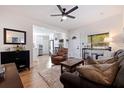 Living room features open concept to kitchen and access to bedroom at 826 53Rd N Ter, St Petersburg, FL 33703