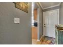 Bright condo entryway with access to kitchen and living room at 10199 Sailwinds S Blvd # I-102, Largo, FL 33773
