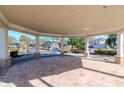Covered pavilion with playground views and seating at 13419 Lake Monroe Pl, Riverview, FL 33579