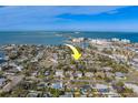 Aerial view showing home's location near the water at 2480 Del Rio Way, Dunedin, FL 34698