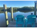 Relaxing waterfront view from comfortable dockside chairs at 3132 Phoenix Ave, Oldsmar, FL 34677