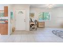 Bright and spacious entryway with tile flooring and home office at 511 Duxbury Ct # C, Safety Harbor, FL 34695