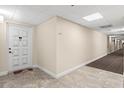 Building hallway with light-colored walls and flooring at 700 Island Way # 704, Clearwater Beach, FL 33767