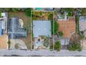 Aerial view of the home showcasing the lot, roof, and surrounding neighborhood at 2812 Miriam S St, Gulfport, FL 33711