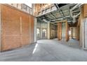 Spacious unfinished interior with high ceilings and large windows at 309 Pruett Rd, Seffner, FL 33584