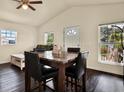 Casual dining area with a granite table and four chairs at 5310 Van Doren Ave, New Port Richey, FL 34652