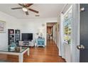 Bright living room featuring hardwood floors and a large window at 5570 4Th N Ave, St Petersburg, FL 33710