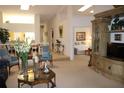 Open living room with high ceilings and views into other areas at 7108 Saint Andrews Ln, Sarasota, FL 34243