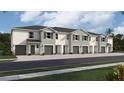 Modern townhome community with attached garages and neutral color palette at 1532 Hammer Pl, Largo, FL 33774