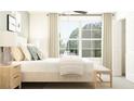 Bedroom with queen bed, large window, and beige color scheme at 17542 Shirewood Way, Land O Lakes, FL 34638