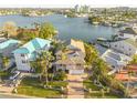 An aerial view of a house on the water, showing surrounding houses at 238 71St Ave, St Pete Beach, FL 33706