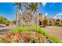 Grand entrance to the community with landscaping at 2741 Via Cipriani # 930A, Clearwater, FL 33764