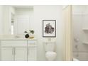Clean bathroom with white vanity, toilet, and shower/tub combo at 3636 Forest Path Dr, Plant City, FL 33565
