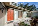 Condo exterior with private entrance and patio at 11805 Northtrail Ave, Temple Terrace, FL 33617