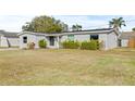Remodeled home with a spacious front yard at 509 Florida S Cir, Apollo Beach, FL 33572