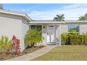 Inviting front entrance with updated landscaping at 509 Florida S Cir, Apollo Beach, FL 33572