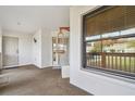 Covered front porch with access to the home at 9214 Golf View Dr, New Port Richey, FL 34655