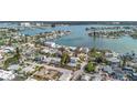 Aerial view of the property and surrounding waterfront community at 140 142Nd E Ave, Madeira Beach, FL 33708