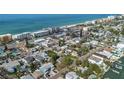 Aerial view showing home's location near the beach and other houses at 140 142Nd E Ave, Madeira Beach, FL 33708