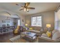 Bright and airy living room with hardwood floors and comfortable seating at 2701 W Cordelia St, Tampa, FL 33607