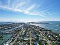 Wide view of waterfront homes and the coastline at 289 Monte Cristo Blvd, St Petersburg, FL 33715