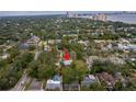 Property location shown from above with a view of surrounding houses at 2932 W Alline Ave, Tampa, FL 33611