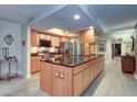 Updated kitchen featuring granite countertops and stainless steel appliances at 36750 Us Highway 19 N # 20-205, Palm Harbor, FL 34684