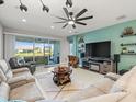 Bright living room with a view of the backyard at 4719 Avila Lakes Dr, Wimauma, FL 33598