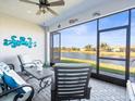 Relaxing screened patio overlooking a lake at 4719 Avila Lakes Dr, Wimauma, FL 33598