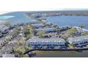 Aerial view of waterfront community with lush landscaping and boat slips at 5176 Se Salmon Se Dr # D, St Petersburg, FL 33705