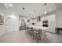 Modern kitchen with stainless steel appliances and an island at 920 N Osceola Ave # 702, Clearwater, FL 33755