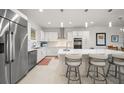 Modern kitchen with stainless steel appliances and an island at 920 N Osceola Ave # 702, Clearwater, FL 33755