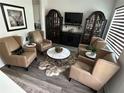 Home bar with seating and display cabinets at 5980 Central Ave, New Port Richey, FL 34653