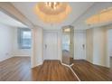 Bright and spacious entryway with wood-look floors at 8001 Sailboat Key S Blvd # 202, St Pete Beach, FL 33707
