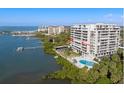 Luxury waterfront condo building with pool and private boat docks at 500 N Osceola Ave # 406, Clearwater, FL 33755