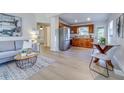 Open concept kitchen with wood cabinets and stainless steel appliances at 2942 24Th N Ave, St Petersburg, FL 33713