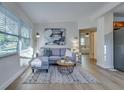 Bright living room featuring a comfy sectional sofa and large artwork at 2942 24Th N Ave, St Petersburg, FL 33713